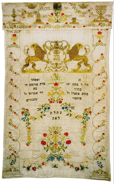 In 1775, Mr. and Mrs. Mendelssohn had a Torah curtain made from Fromet’s silk wedding dress.  Torah curtain, 1774 – 1775, © Jüdisches Museum Berlin / photo: Hans-Joachim Bartsch.ora-Vorhang anfertigen. Tora-Vorhang, 1774 – 1775, © Jüdisches Museum Berlin / Foto: Hans-Joachim Bartsch